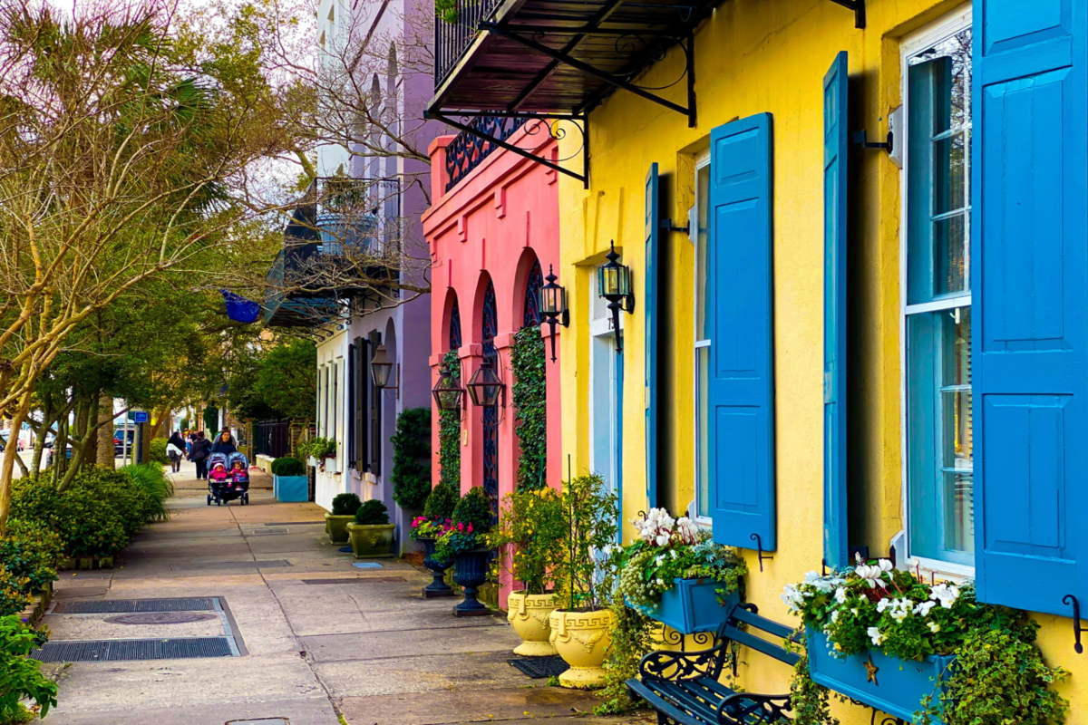 Colorful row houses lining the narrow streets in historic Charleston.