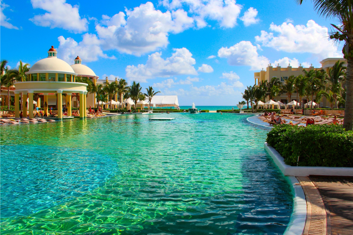 Swimming pool complex at a luxury, all-inclusive resort along the Riviera Maya coast in Mexico.