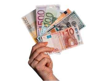 A hand holding bills in several currencies, including US and euro.